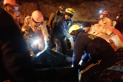 Uttarakhand police personnel, SDRF and NDRF jawans at work inside the Tapovan Tunnel. (Image: Twitter)