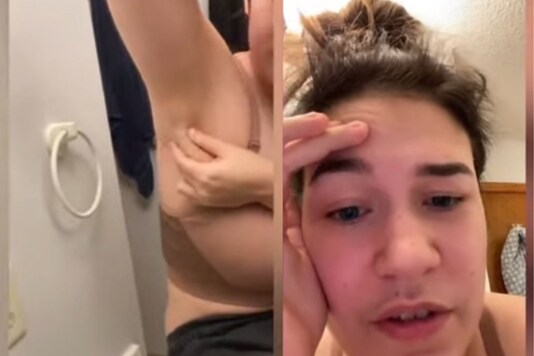 Video grab of woman shooting milk from armpits.
(Credit: YouTube)