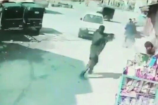 The terrorists shot the two policemen from close range on high security airport road, killing one officer and injuring the other.