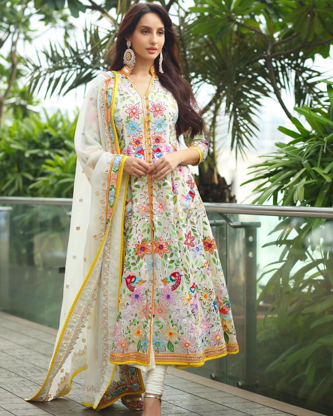 Nora Fatehi looks chic in the floral suit.