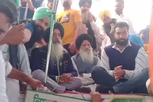 File image of  Lakha Sidhana (in white shirt and sweater), an accused in Jan 26 Delhi violence, was seen at a farmers' rally in Bathinda.  (ANI)