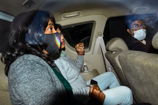 Climate activist Disha Ravi leaves after a hearing in a 'toolkit' case at Patiala House Court in New Delhi on Tuesday. (PTI)