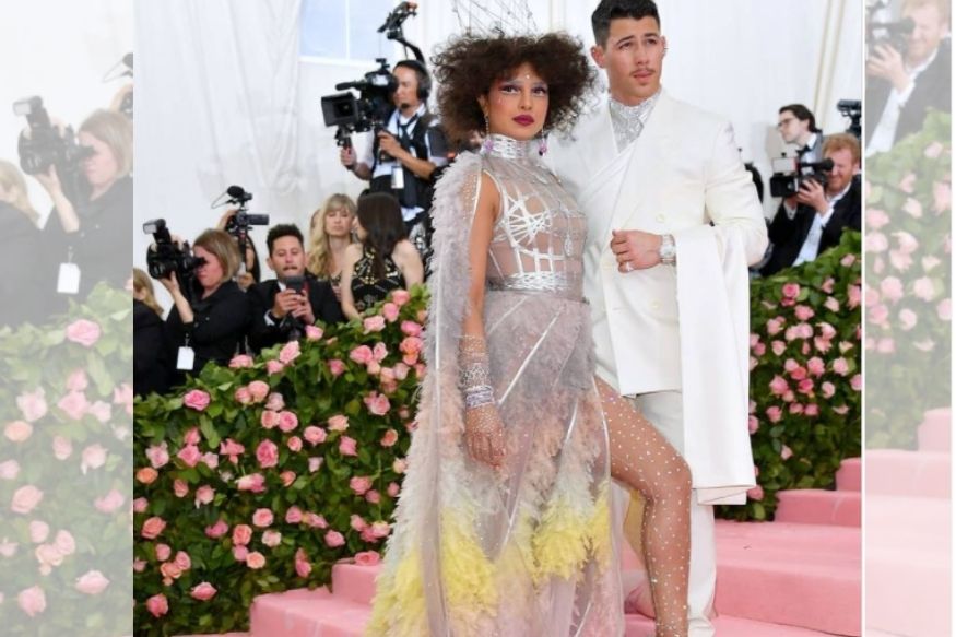  Priyanka raised many eyebrows with her appearance which appeared to be inspired by Lewis Carroll’s 'Alice In Wonderland'. Dressed in a grey-yellow-pink Dior gown, Priyanka arrives with her husband Nick Jonas at the Met Gala. Priyanka complimented her look with a spiky silver gown with her hair in tight and frothy curls. Photo: Instagram/Priyanka Chopra
