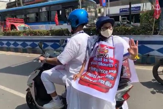 Mamata Banerjee on an electric scooter. (Twitter/@AITCofficial)