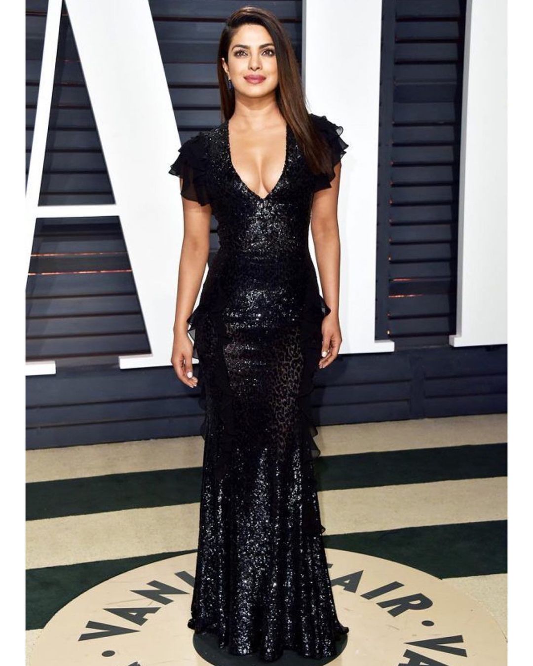 Priyanka Chopra looks stunning in a black shimmery gown at Vanity Fair. (Image: Instagram) Priyanka Chopra looks stunning in a black shimmery gown at Vanity Fair. (Image: Instagram)