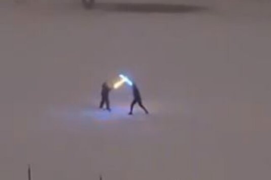 Screengrab of the viral video showing two men recreating the iconic scene.