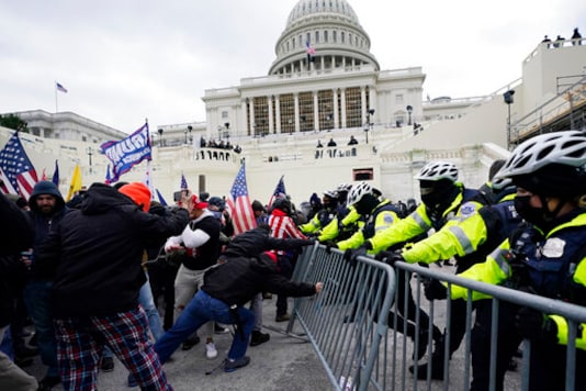 Dozens Charged In Capitol Riots Spewed Extremist Rhetoric Dozens Charged In Capitol Riots Spewed Extremist Rhetoric