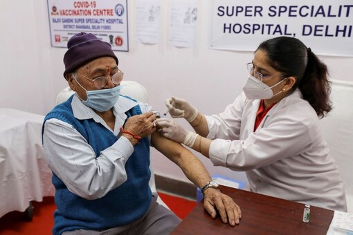 A man receives a dose of COVISHIELD at a medical centre in New Delhi. (REUTERS/Anushree Fadnavis)