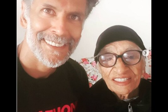 Milind Soman and 105-year-old mascot of Pinkathon. 
(Credit: IG/ milindrunning)