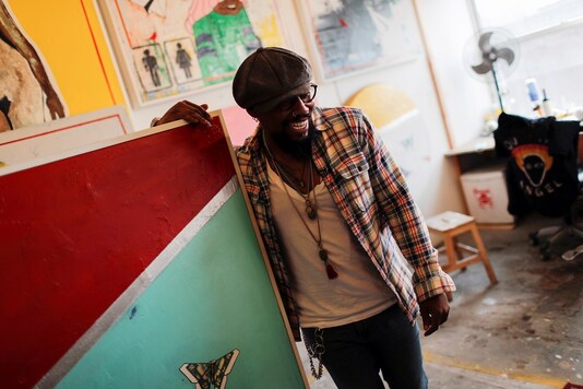 Artist Guy Stanley Philoche is pictured in his painting studio in the Harlem section of Manhattan in New York City. (Credit: REUTERS/Mike Segar)