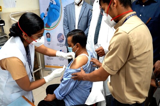 Arvind Kejriwal being administered the COVISHIELD vaccine.