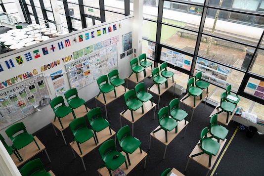 An empty classroom at Great Academy Ashton in Ashton-Under-Lyne, England, Thursday, March 4, 2021. (AP Photo)