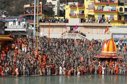 Naga Sadhus take a dip at Ganga river at "Kumbh Mela" in Haridwar. (Reuters)