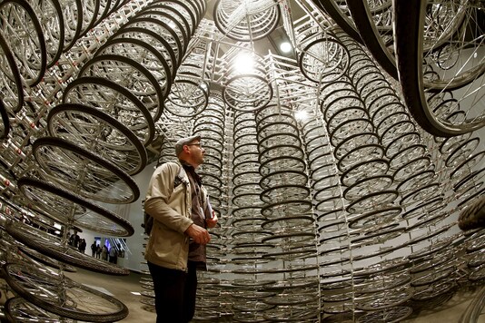 FILE PHOTO: A visitor looks up inside the installation artwork called 