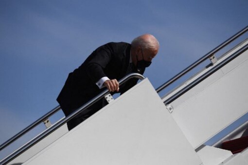 US President Joe Biden trips as he boards Air Force One at Joint Base Andrews in Maryland on March 19, 2021. President Biden travels to Atlanta, Georgia, to tour the Centers for Disease Control and Prevention, and to meet with Georgia Asian American leaders, following the Atlanta Spa shootings.
Eric BARADAT / AFP
AFP