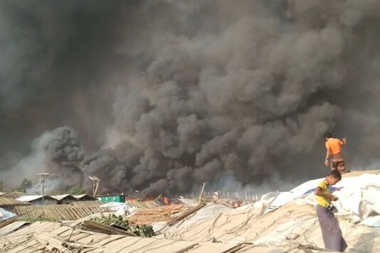 Smoke is seen at Balukhali Refugee Camp, in Cox's Bazar, Bangladesh, March 22, 2021. Via REUTERS