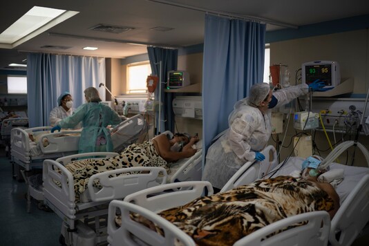 COVID-19 patients are treated in the ICU of the Sao Jose municipal hospital, in Duque de Caxias, Brazil, Wednesday, March 24, 2021. (AP Photo)