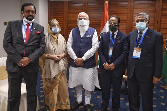 PM Narendra Modi engages with opposition leaders of Bangladesh. (Image: Twitter/@MEAIndia)