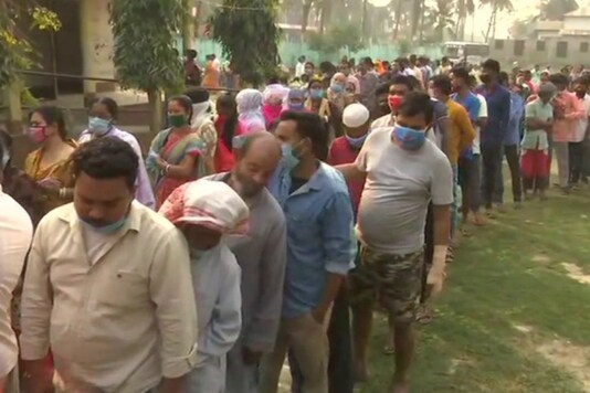 A long queue of voters at a polling centre in Rupahi, Nagaon District (ANI)