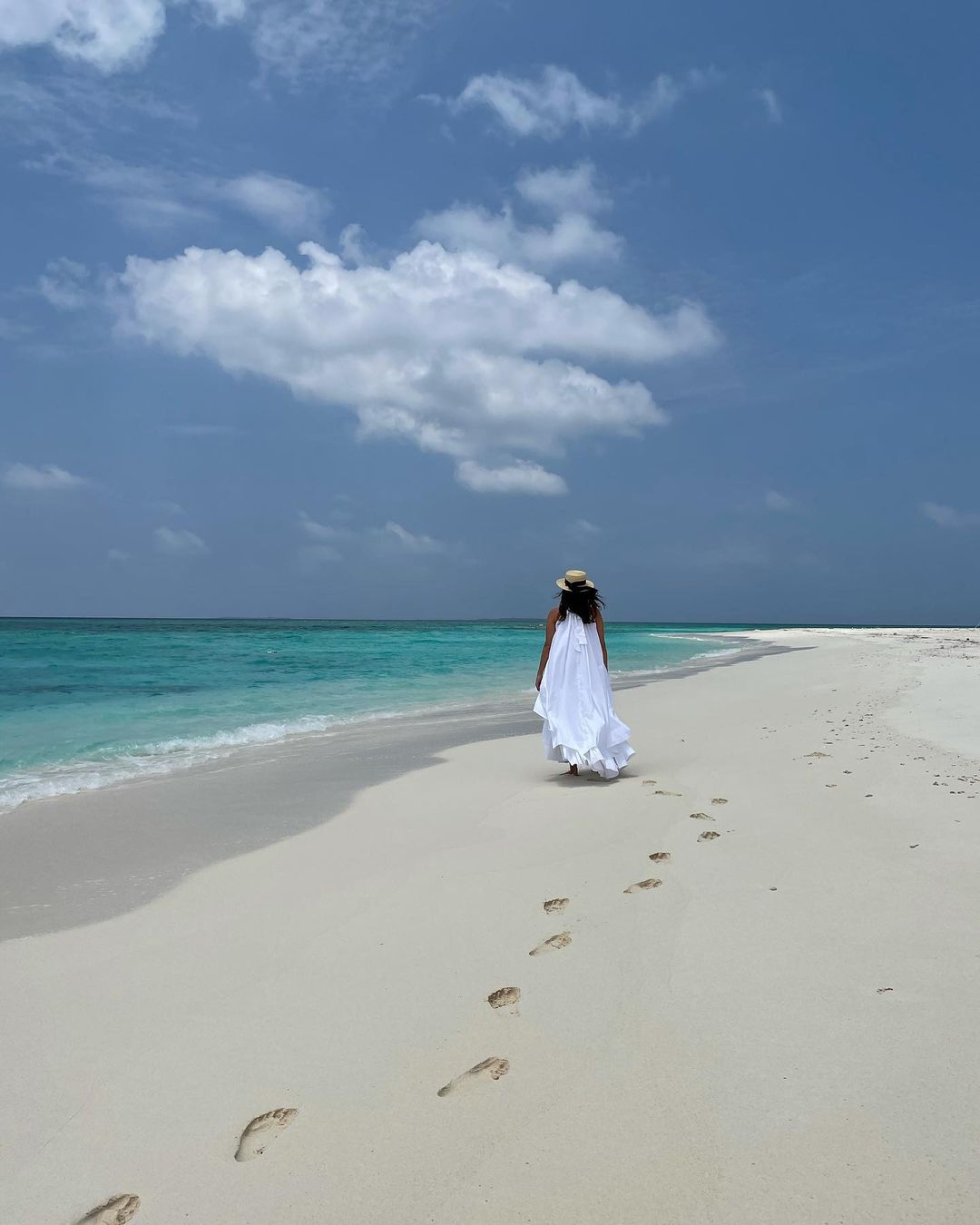  Dia Mirza walking on the white sands looks like a scene straight out of a movie. (Image: Instagram)
