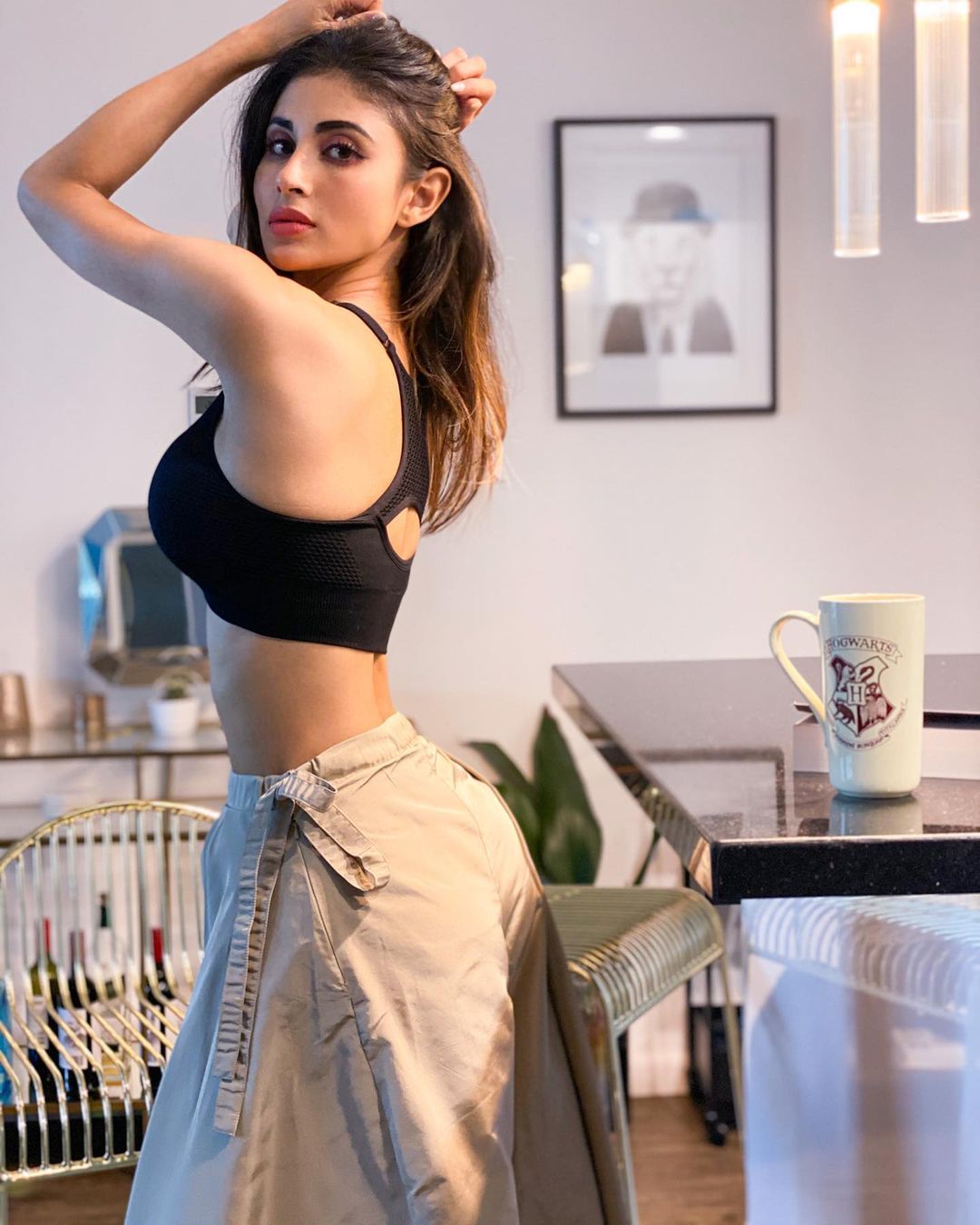 17. 6. Mouni Roy flaunts her sexy curves as she poses in a black sports bra...