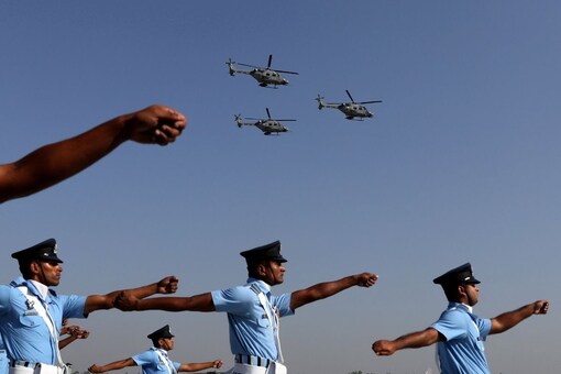 Indian Air Force (IAF) soldiers march as advanced light helicopters fly during the Indian Air Force Day celebrations at the Hindon Air Force Station on the outskirts of New Delhi, India, October 8, 2019. (Reuters)