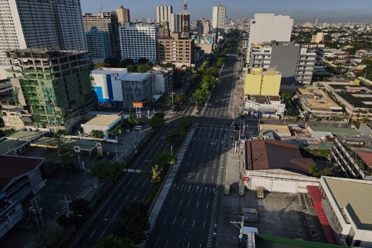 An almost empty Quezon Boulevard is seen as the government implements a strict lockdown to prevent the spread of the coronavirus on Good Friday, April 2, 2021 in Quezon city, Philippines. (AP Photo)