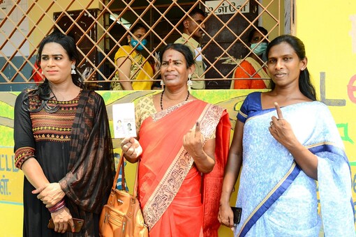 Voters show their finger marked with indelible ink after casting their votes in Chennai. (PTI)