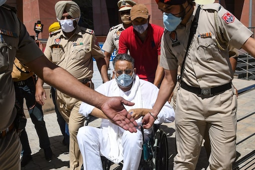 Mukhtar Ansari being produced in a Mohali court on March 31. (PTI)