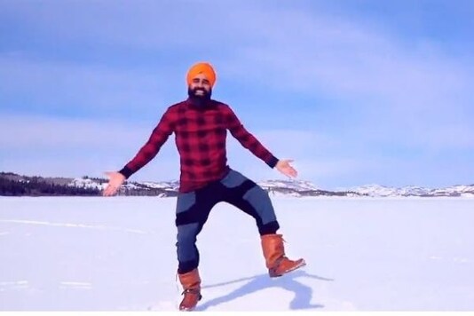 Video grab of Canadian artist doing bhangra on frozen lake after receiving covid vaccine. 
(Credit: Twitter)