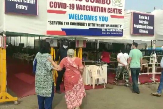 Elderly people arrive at BKC vaccination centre in Mumbai amid weekend lockdown.