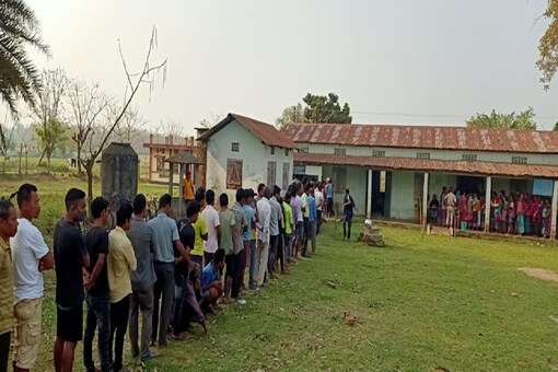 People queue up to cast their votes for Garo Hills Autonomous District Council (GHADC) polls. (Image: News18)