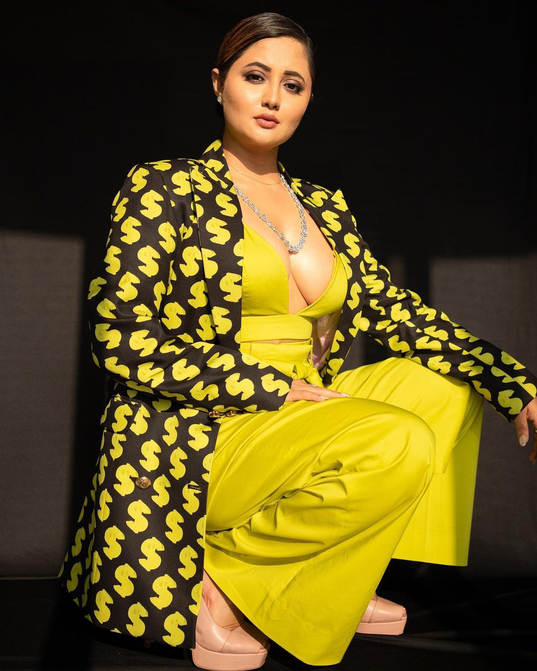 Rashami Desai looks vibrant in the plunging top and matching neon green pants. (Image: Instagram)