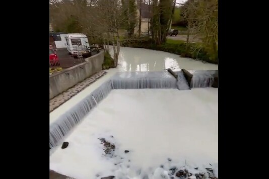 Photos and videos of the River Dulais in Wales show its water turned white(Credit: twitter)