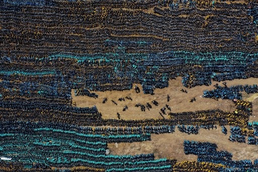  Many bikes suffered damage or were stolen, while some were even repurposed into makeshift barricades when Covid-19 broke out last year. The problem is a familiar one to cities around the world battling to round up stray bikes.<br />(Photo by STR / AFP) / China OUT