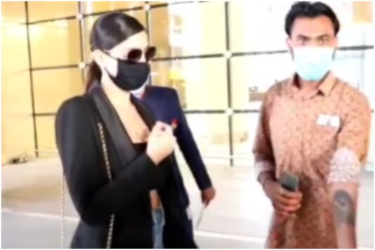 Nora Fatehi with fan