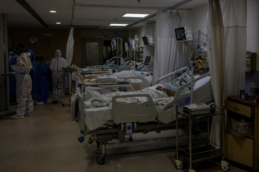 Patients suffering from COVID-19 are seen inside the ICU ward at Holy Family Hospital in New Delhi. (Reuters)
