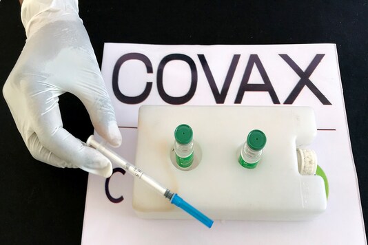 A nurse prepares to administer the AstraZeneca/Oxford vaccine under the COVAX scheme against the COVID-19 at the Eka Kotebe General Hospital in Addis Ababa, Ethiopia. (Reuters)