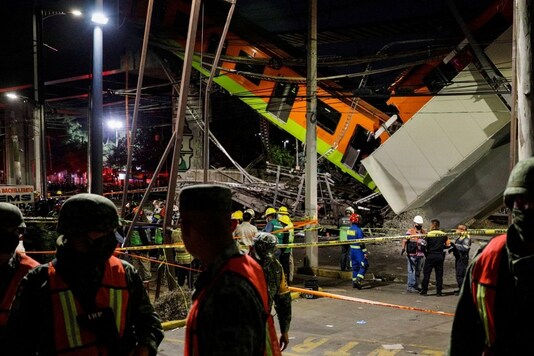 Security camera footage broadcast by local media showed the carriages plunging towards the ground in the south of the city. (Reuters)