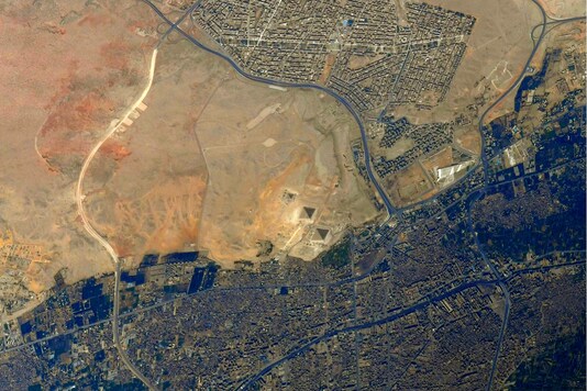 In the image, the Pyramids of Giza, the oldest of the seven wonders, can be seen surrounded by the Western desert. (@Astro_Soichi/Twitter)