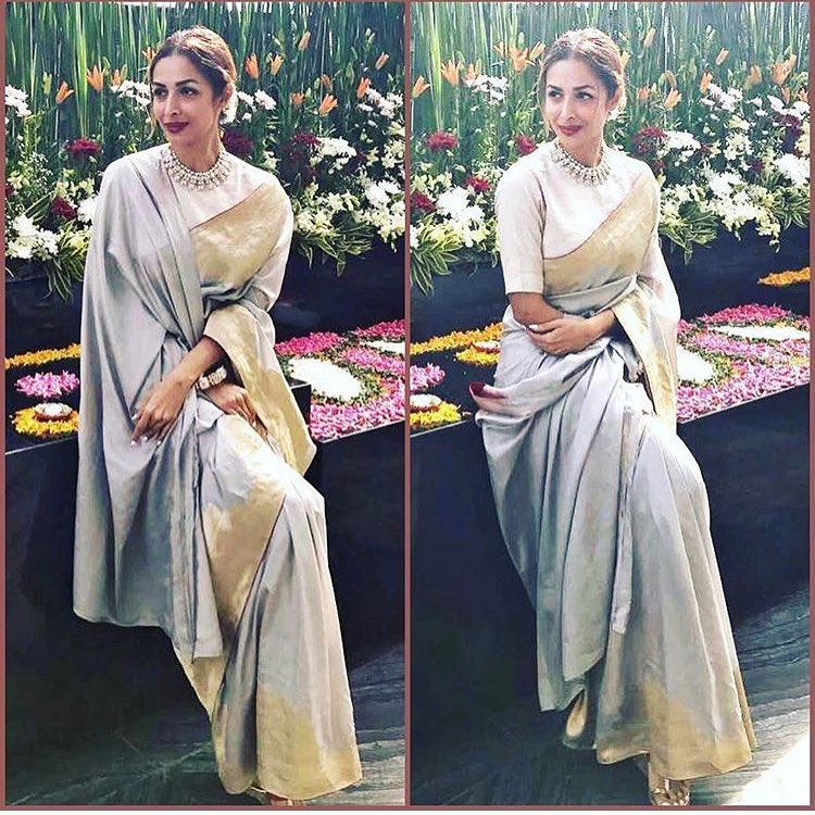  Malaika Arora stuns in this absolutely gorgeous silver and golden saree. (Image: Instagram)