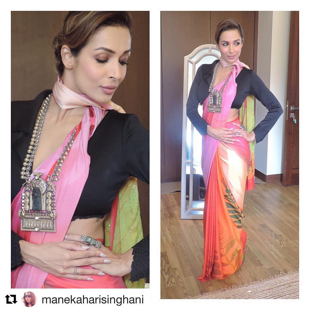  Malaika Arora looks hot and sexy in a stunning printed saree paired with a black blouse. (Image: Instagram)