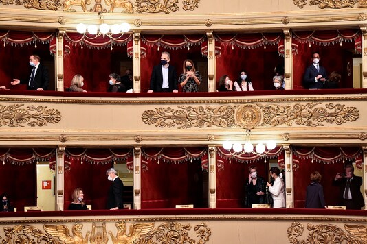 People attend the re-opening of La Scala opera house after it was closed due to the coronavirus disease (COVID-19) pandemic, in Milan.

REUTERS/Flavio Lo Scalzo
