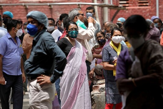People wait for their turn to take vaccines in Kolkata. (Reuters)