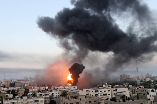 Smoke and flames rise during Israeli air strikes amid a flare-up of Israeli-Palestinian violence, in Gaza. (Reuters)