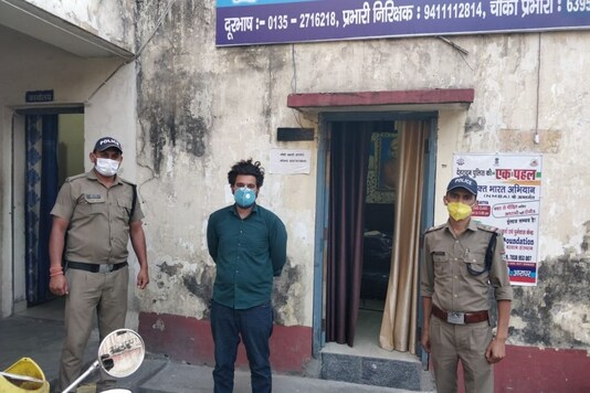 Accused Guru Sujan Singh in police custody in Dehradun. (Image: Dehradun police)