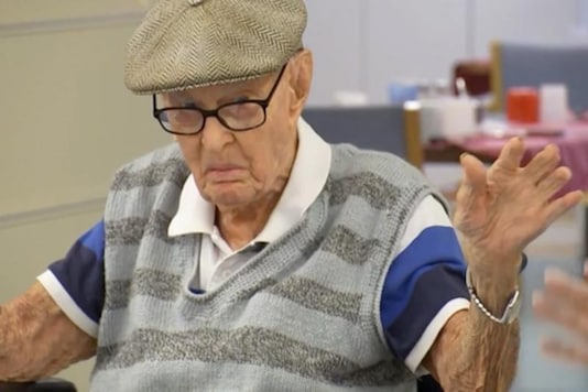 In this image made from video, Australia's Dexter Kruger gestures at a nursing home in the rural Queensland state town of Roma, Australia. Credits: AP.