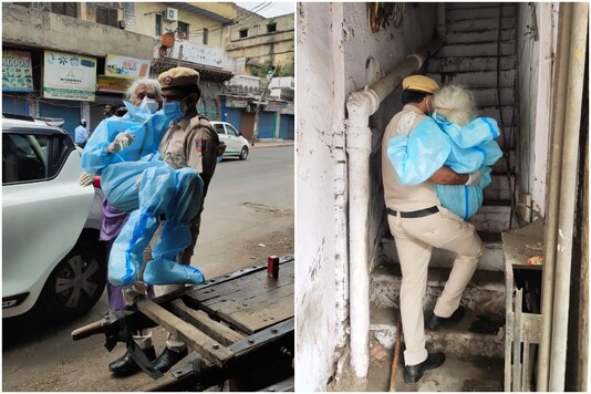 A Delhi cop carrying an elderly woman to a vaccination centre | Image credit: Twitter