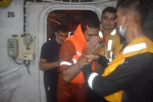 A man thanks rescuers with folded hands after being brought safely to the shore. (Image: Indian Navy) 