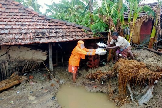 Nandigram: NDRF team carries out a rescue operation after lanfall of cyclone Yaas at South 24 parganas. 